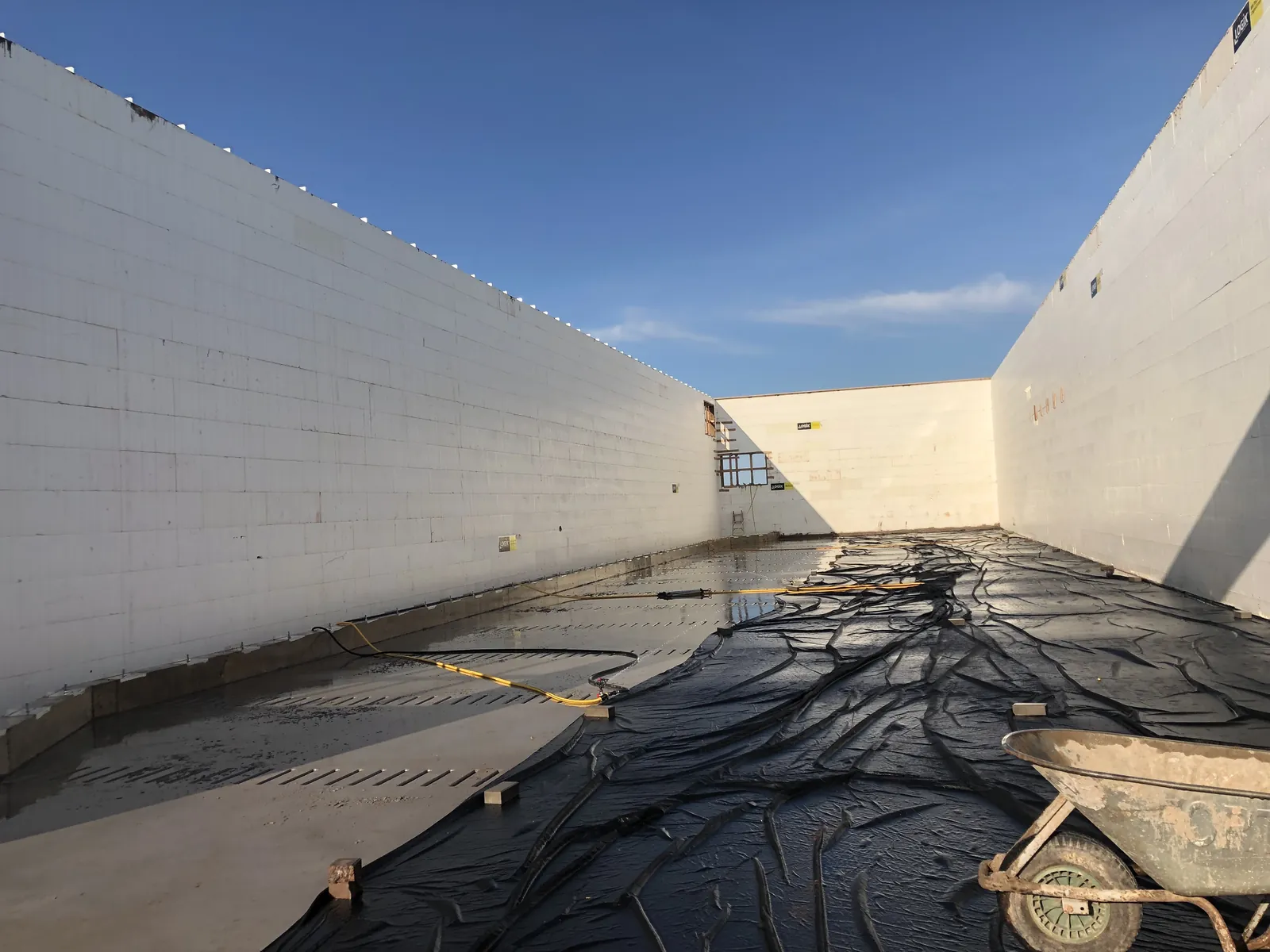 Insulated Concrete Form walls standing on a finished slab