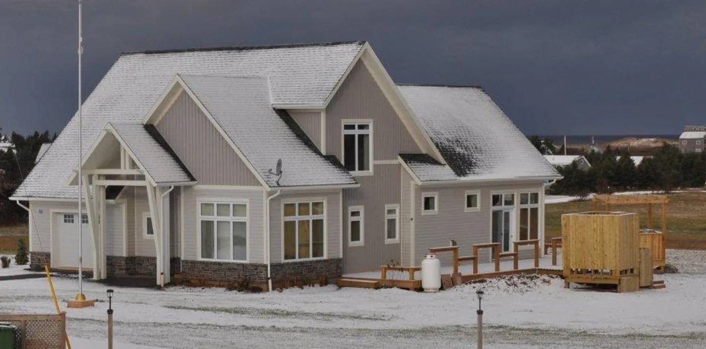 A finished home in the first snow